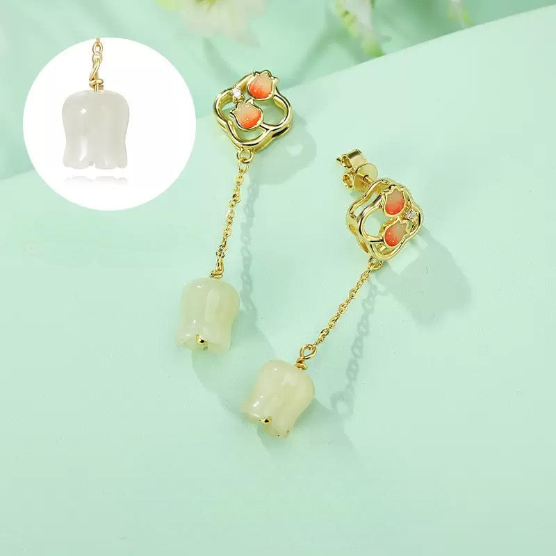 Verduri Hetian jade drop earrings with close up showing carved jade lily charms, enamel tops and stud backs