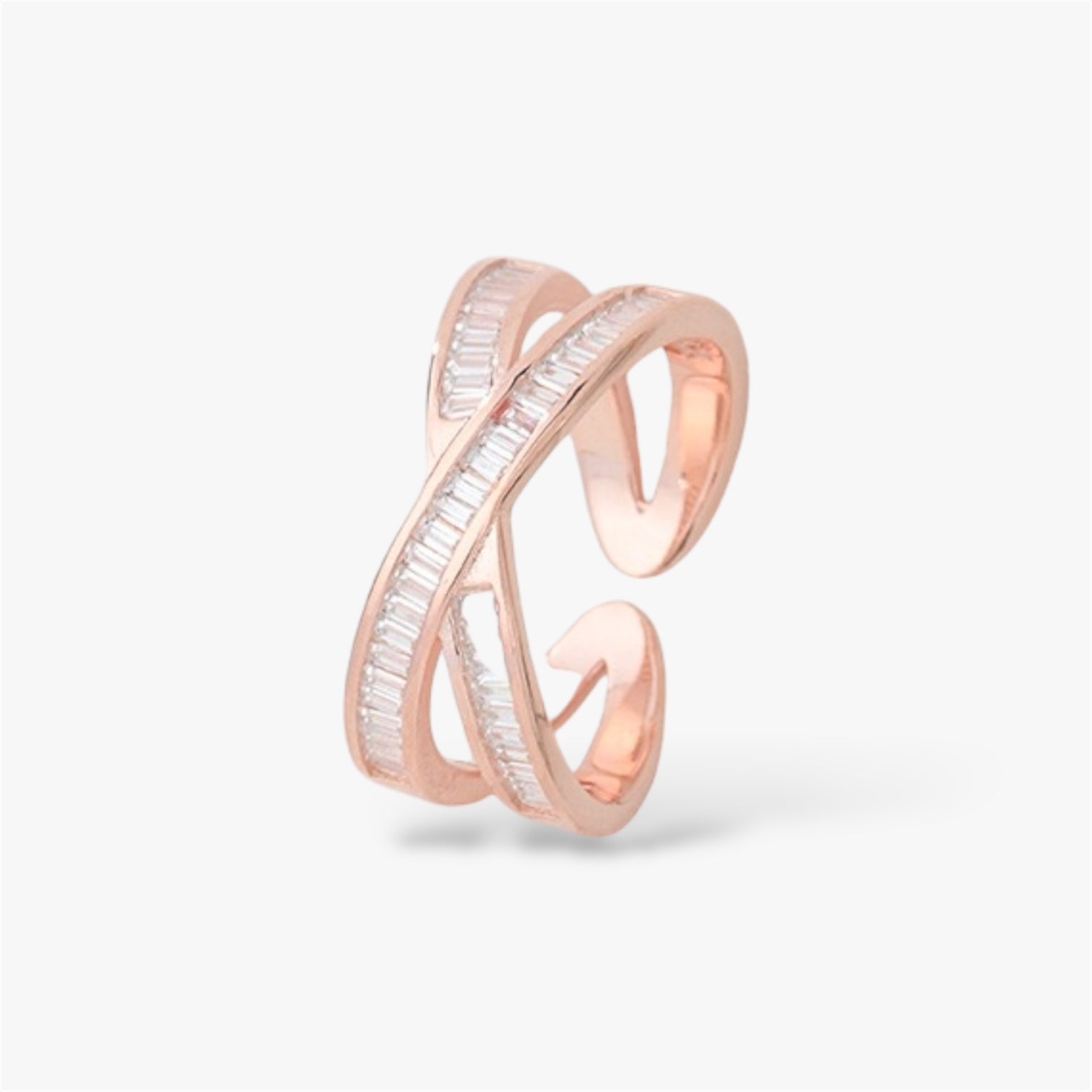 Rose gold adjustable ring with crisscross design and minimalist baguette stones