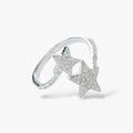 Sterling silver ring with two textured star motifs on white background