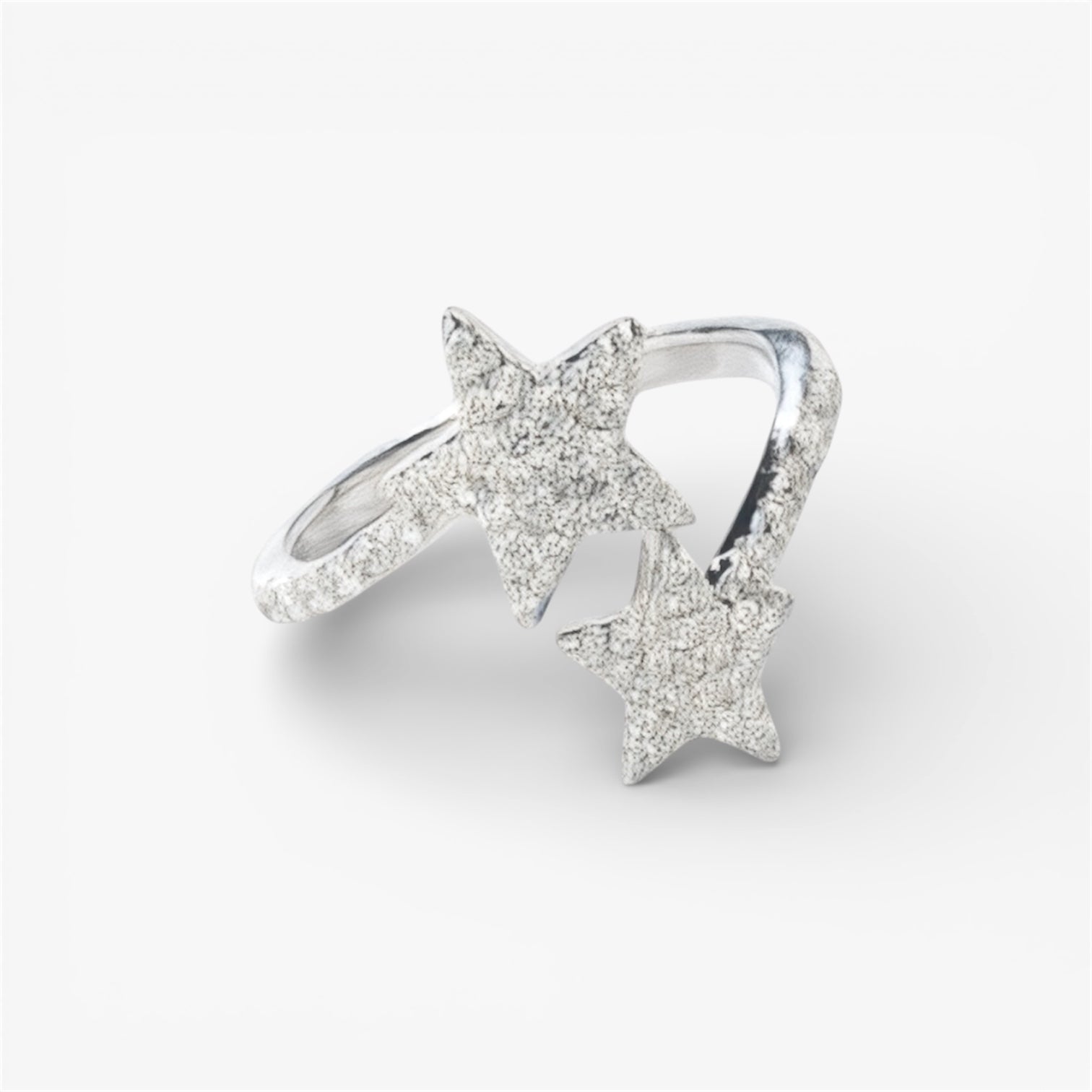 Silver star ring with two textured star accents, minimalist modern jewellery on white background