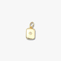 Gold rectangular pendant charm with star design and central gemstone, minimalist jewelry