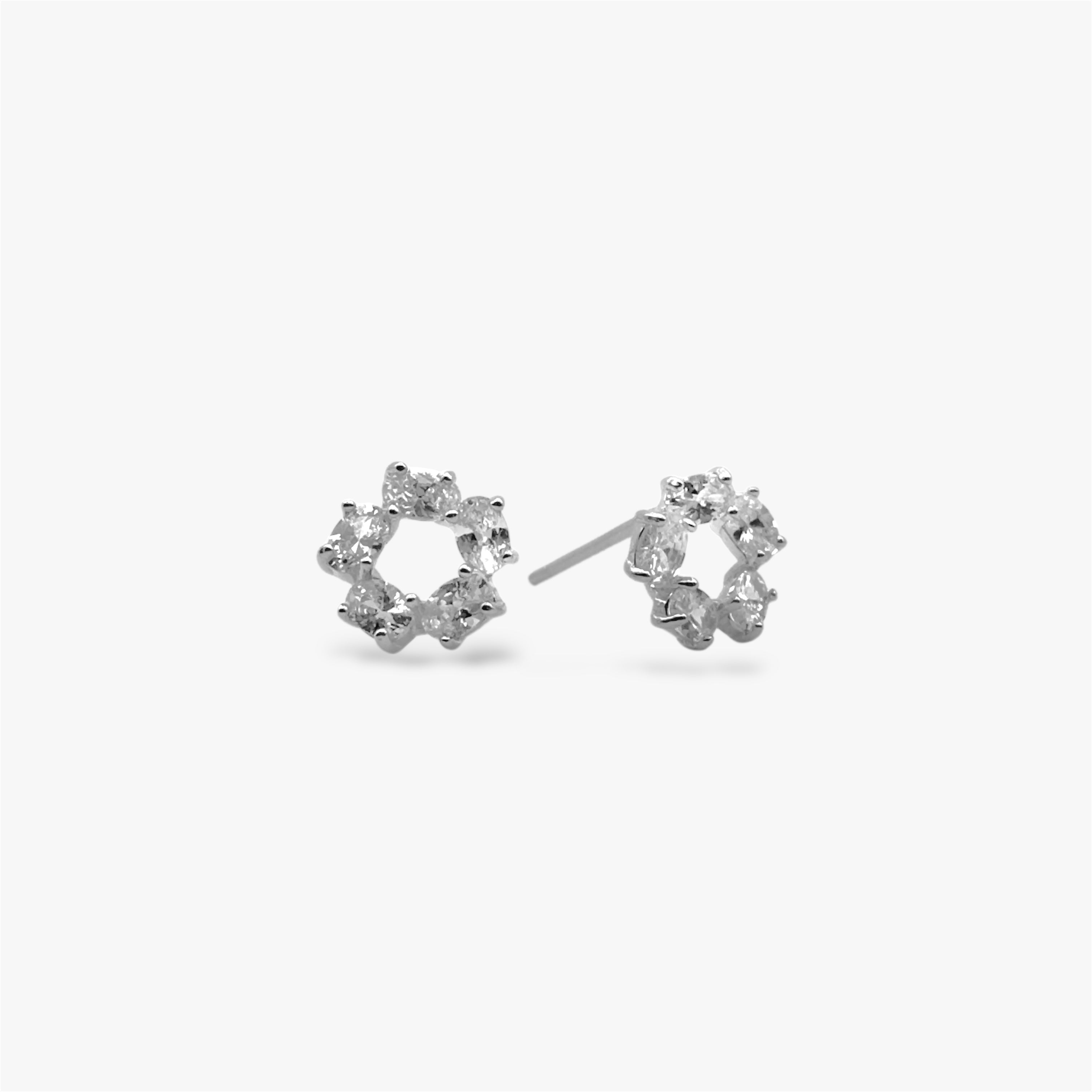 Sparkly circular crystal stud earrings in silver.
