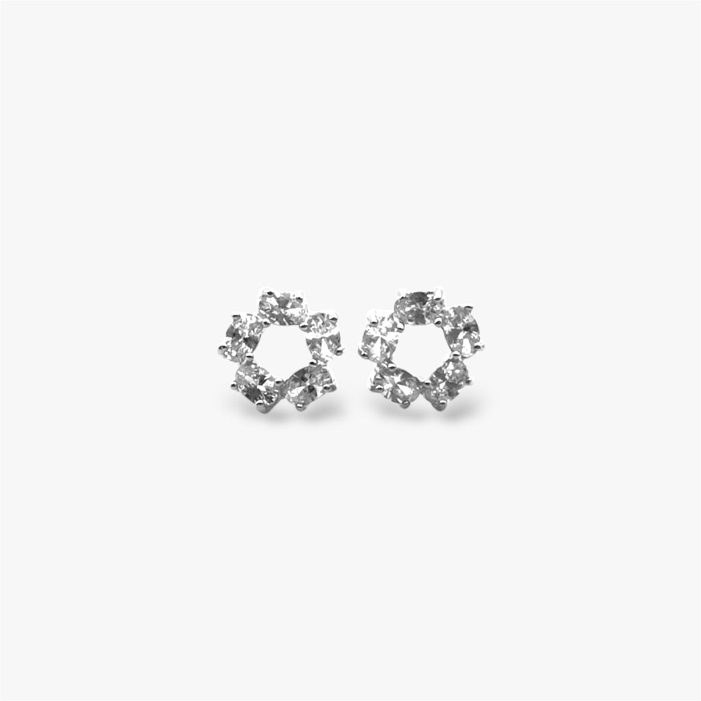 Sparkly circular crystal stud earrings in silver.