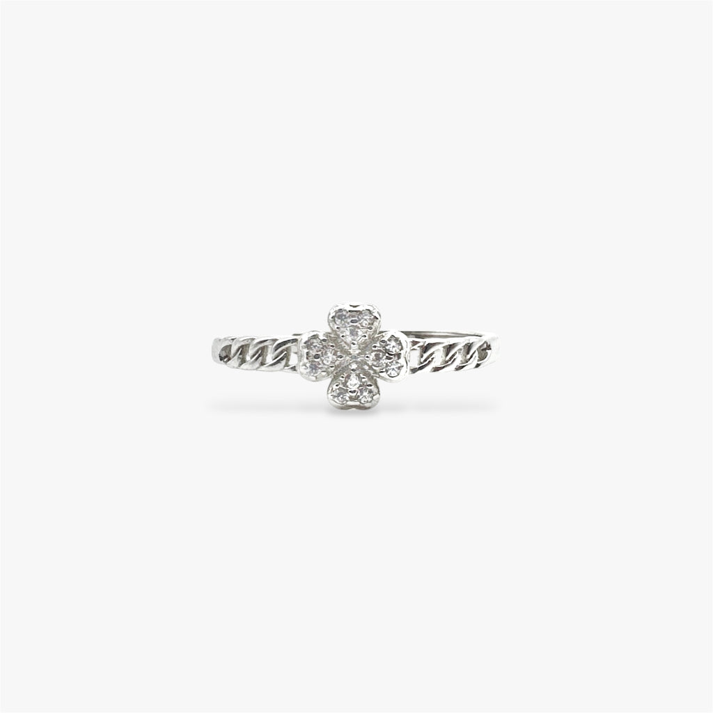 Four leaf clover silver ring with crystals with a small cuban band design.