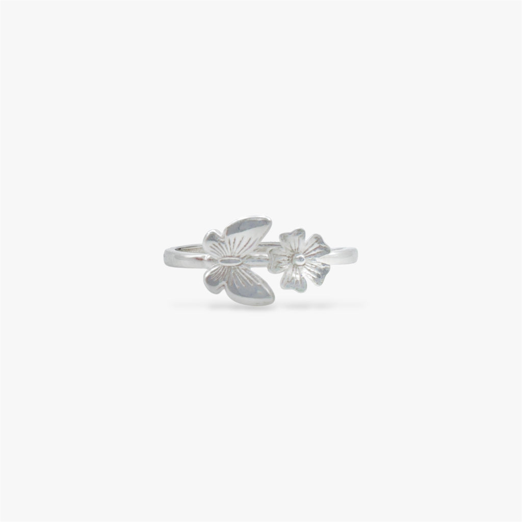 Silver ring with a floral design and a butterfly design.