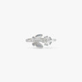 Silver ring with a floral design and a butterfly design.