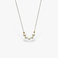 Necklace with freshwater pearls in gold plated sterling silver.
