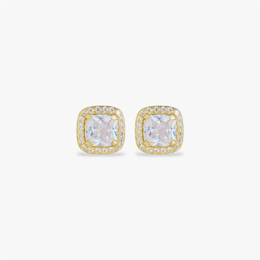 Gold earrings with crystal gemstones on a white background